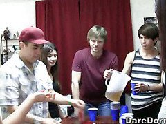 An strip beer pong game goes to the next sexy level.
